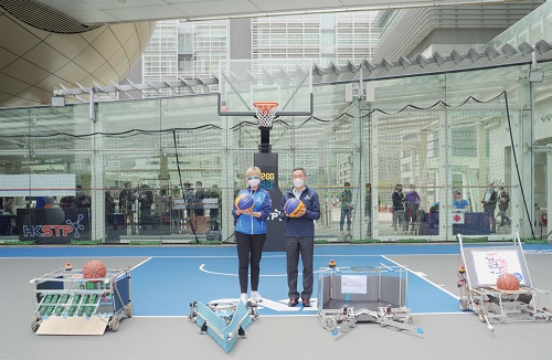 Photo 1: Mr Albert Wong, CEO of HKSTP (right) and Dr Trisha Leahy, Chief Executive of Hong Kong Sports Institute (left) kickstarted HKSTP’s first-ever human x robot basketball competition at its brand new basketball court beneath Hong Kong Science Park’s iconic “Golden Egg” Charles K. Kao Auditorium.