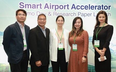 Five start-ups showcased their innovative technologies and solutions to investors and travel industry experts at the “Smart Airport Acceleration Programme” Demo Day. (From left) Representatives of the five companies include: • Barry Leung, Founder & Director, Lambda Sense Limited • Rio Chau, CEO, RV Automation Technology Co. Ltd • Kara Ma, Business Development Manager, PerceptIn Limited • Susie Yuan, Project Manager, CyPhy Media Limited • Lilia Kanesvska, Managing Partner, DMS Solutions (Hong Kong) Limited