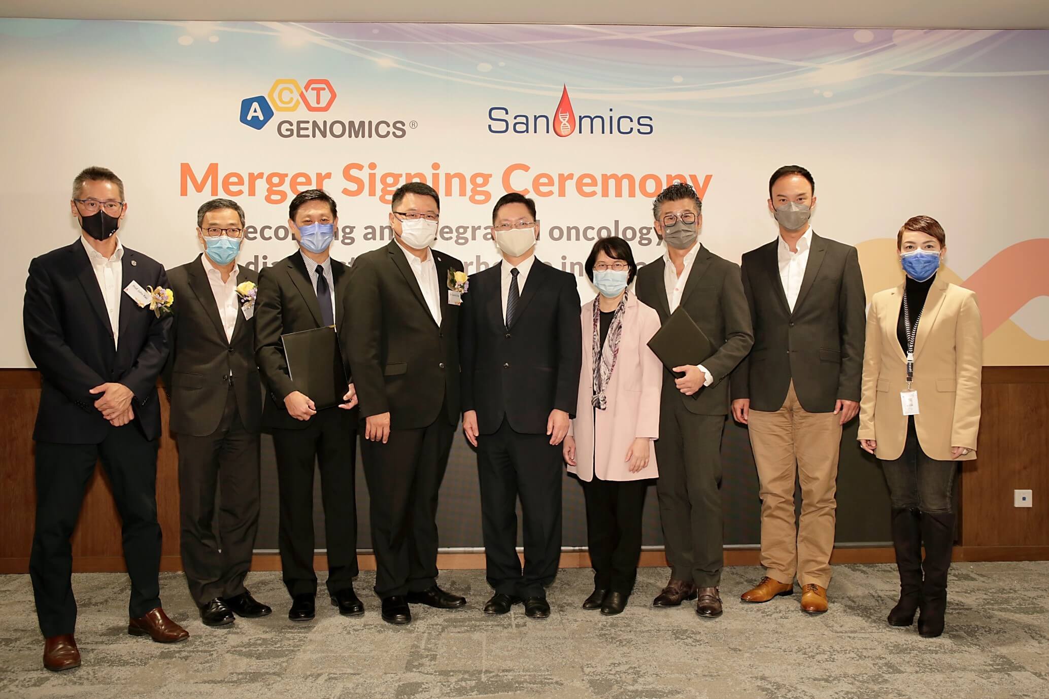 Photo 2: Celebrating the merger with Mr. Alfred Sit, Secretary for Innovation and Technology, Ms. Annie Choi, Permanent Secretary for Innovation and Technology, and management of Hong Kong Science & Technology Parks Corporation. From left to right: Prof John Kao, Head of Institute for Translational Research, HKSTP, Mr. Albert Wong, CEO of HKSTP, Mr. Victor Chan, Chief Financial Officer of ACT Genomics, Dr. Sunny Chai, Chairman of HKSTP, Mr. Alfred Sit, Secretary for Innovation and Technology, Ms. Annie Choi, Permanent Secretary for Innovation and Technology, Prof. Tony Mok, Chairman of Sanomic (Now Chairman of ACT Genomics), Mr. Eugene Hsia, Chief Corporate Development Officer of HKSTP, and Ms. Jojo Cheung, Chief Marketing Officer of HKSTP.