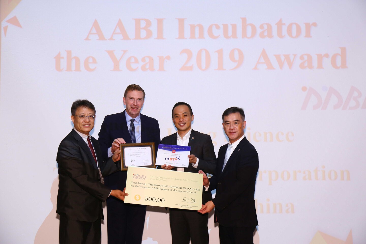 George Tee (2nd from right), Chief Technology Officer of Hong Kong Science and Technology Parks Corporation, and Peter Mok (1st from right), Head of Incubation & Acceleration Programmes, of Hong Kong Science and Technology Parks Corporation, received the Incubator of the Year Award 2019 from Dr. Huang Chingyao (1st from left), President of the Asian Association of Business Incubation, and Mr. Phillip Kemp (2nd from left), Vice President of the Asian Association of Business Incubation, in recognition of HKSTP’s ongoing efforts and outstanding performance in nurturing the growth and success of technology startups.